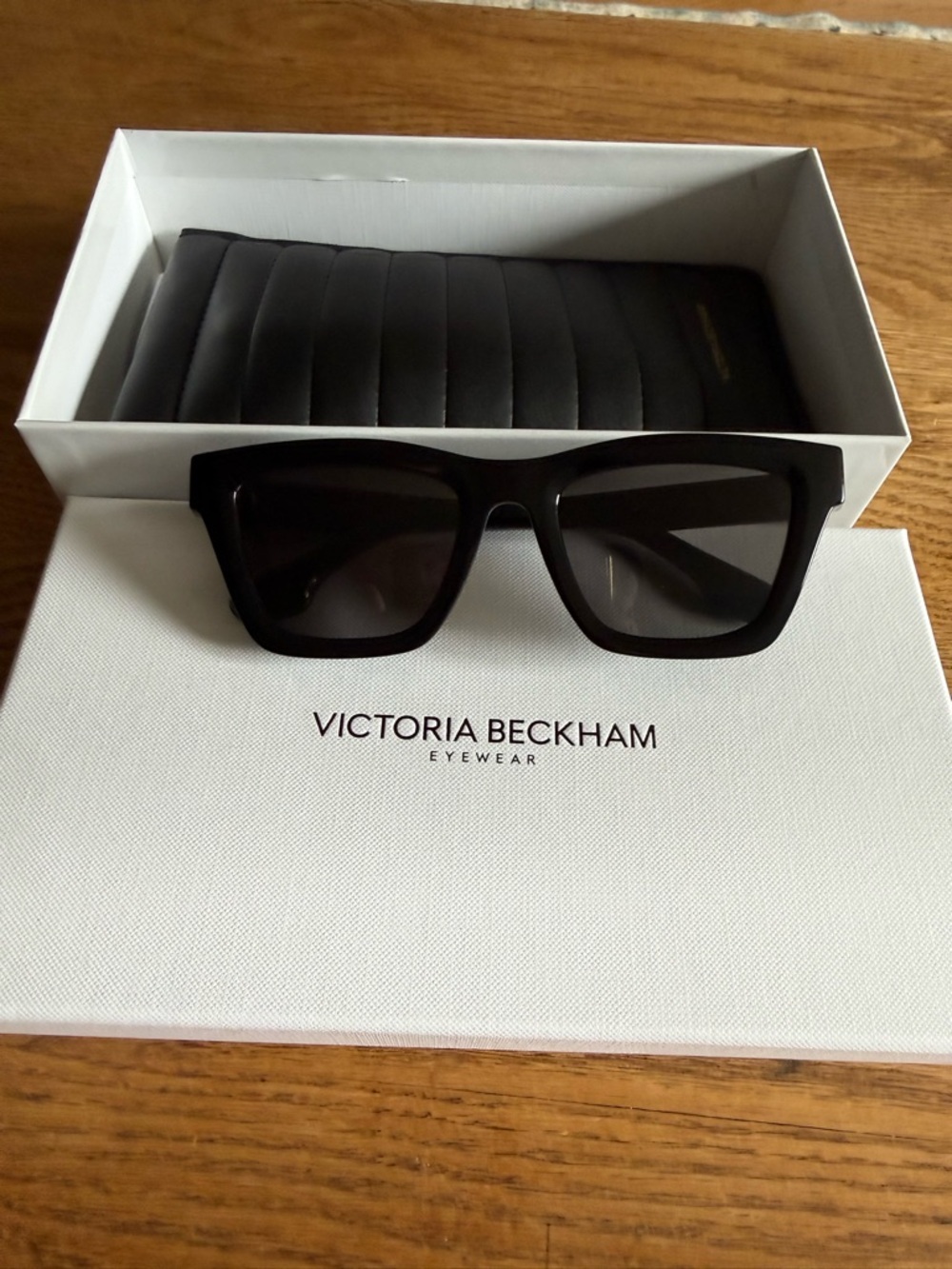 Victoria Beckham Glossy Black Frame Sunglasses with Gold Accents